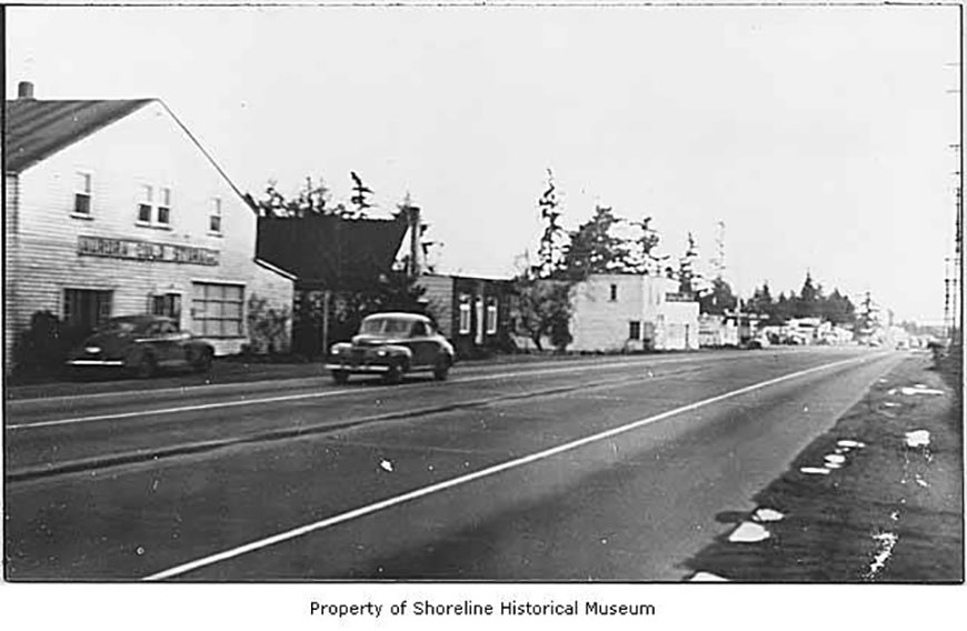 Aurora_Avenue_North_with_a_view_of_Braytons_Cold_Storage_Graneys_Shoe_Repair_Coxs_Garage_Ronald_ca_1948(x568)